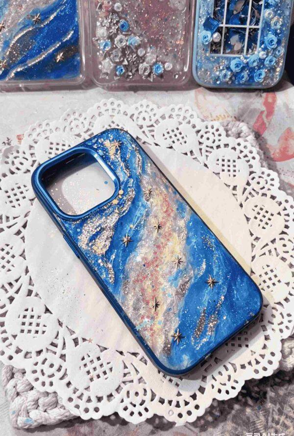 1 (24) Handmade Galaxy Resin Phone Case with Blue Nebula Swirl & Gold Star Accents, Shockproof TPU Cover Compatible with iPhone Series